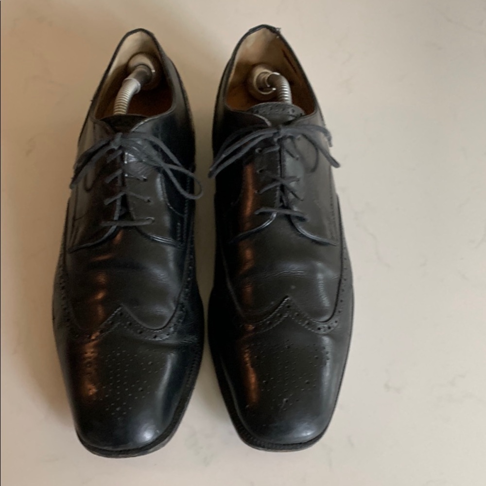 Tod's Black Leather Oxford Shoes